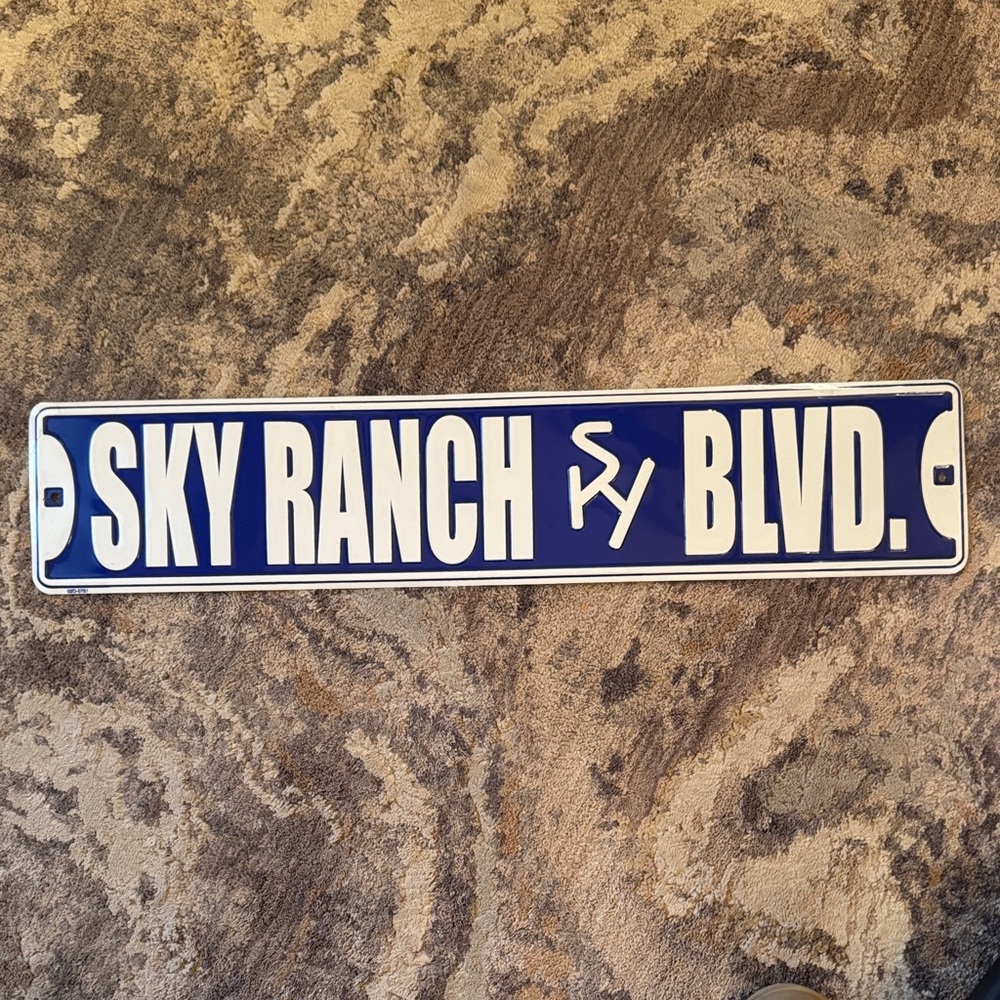 Blue and White 'Sky Ranch Blvd' Sign